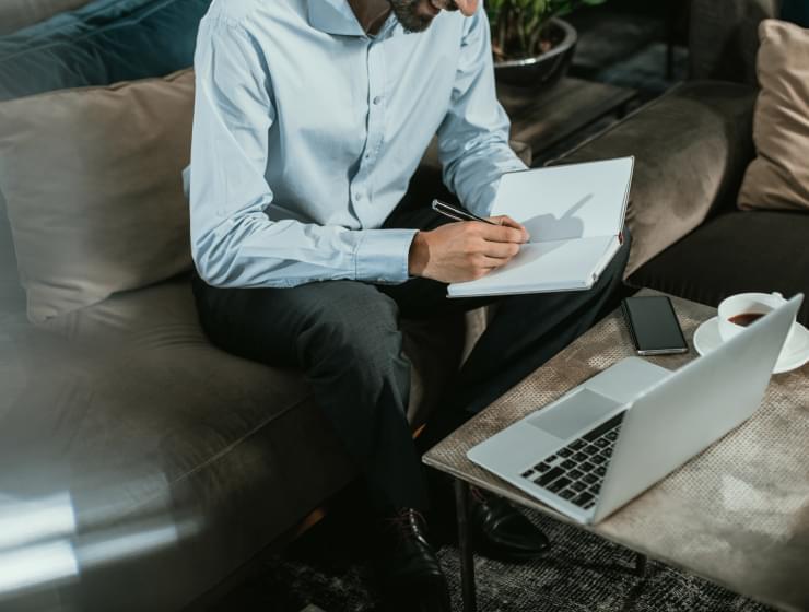 man working from a laptop